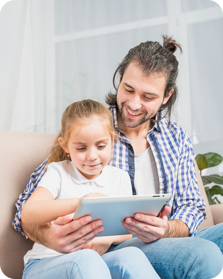 Father and daughter using tablet for online consultation